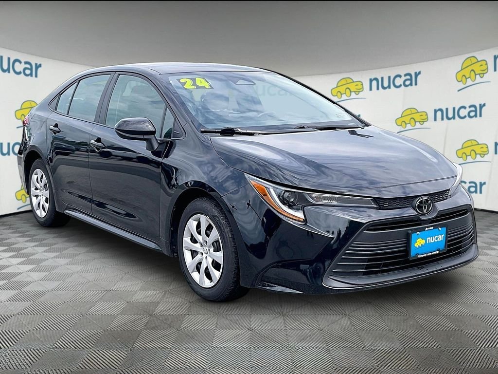 Used 2024 Black Toyota LE image 1