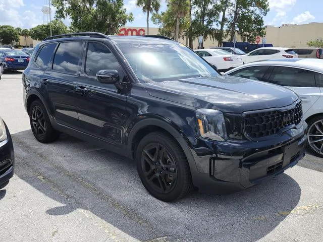 Used 2025 Black Kia EX X-Line image 6