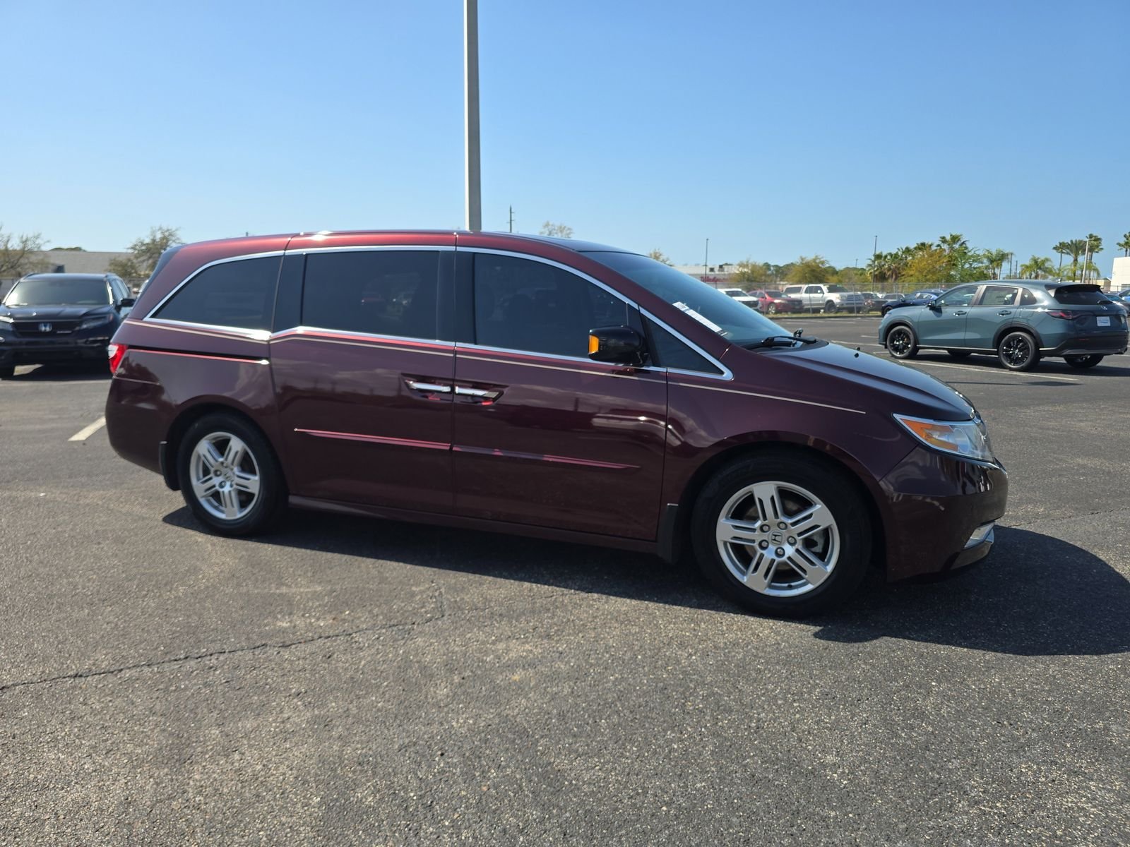 Used 2012 Honda Odyssey Touring with VIN 5FNRL5H9XCB031373 for sale in Port Richey, FL