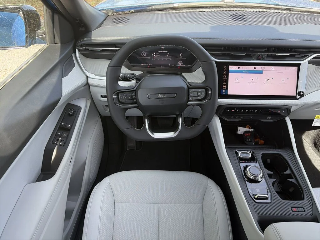 New 2026 Hydro Blue Pearlcoat Jeep Laredo image 14