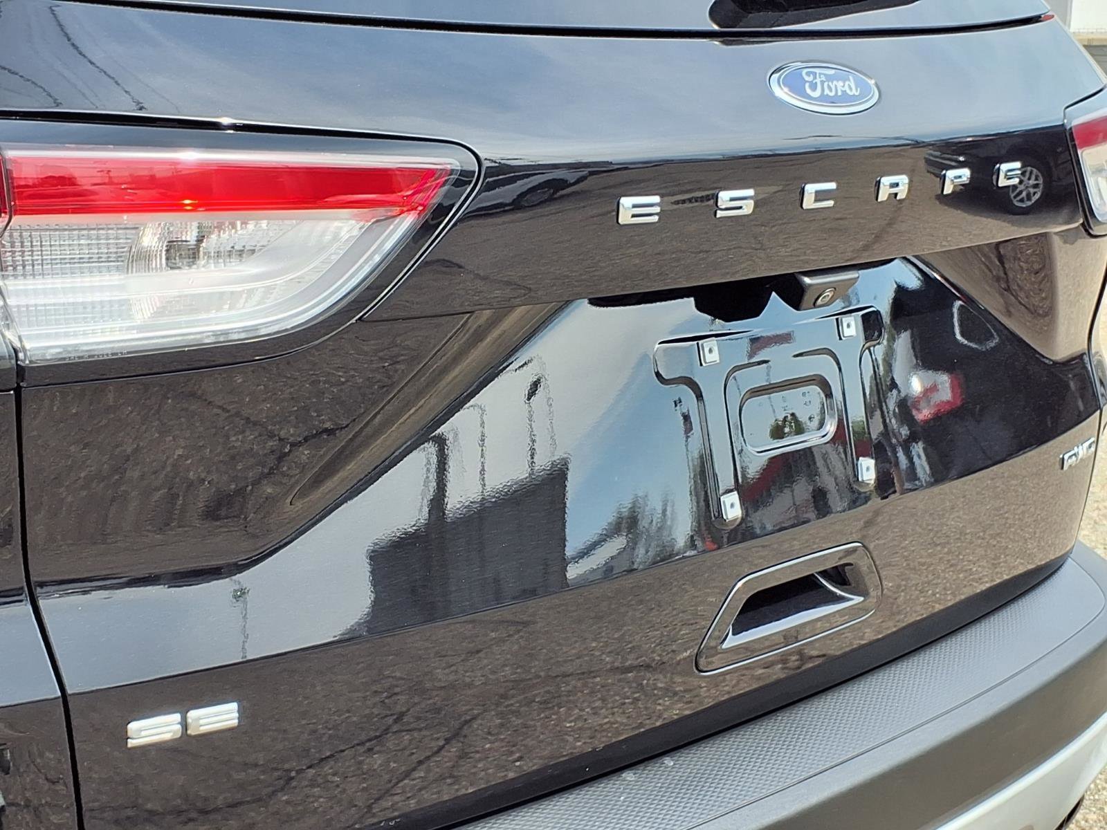 Certified Used 2021 Agate Black Metallic Ford SE image 24