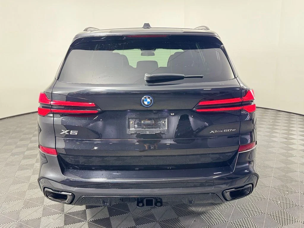 Certified Used 2025 Black Sapphire Metallic BMW xDrive50e image 6