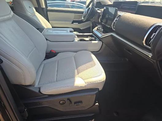 Used 2025 Black Metallic Ford Platinum image 2