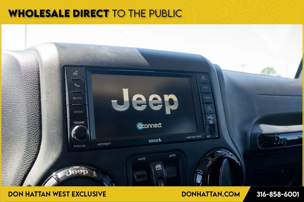 Used 2016 Purple Jeep Unlimited Sahara image 5