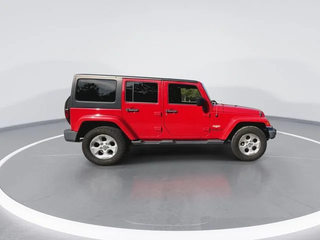 Used 2014 Red Jeep Unlimited Sahara image 12
