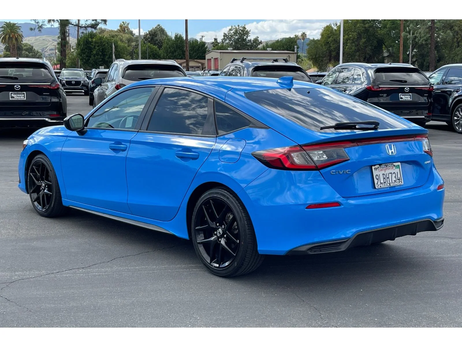 Used 2024 Boost Blue Pearl Honda Sport image 3