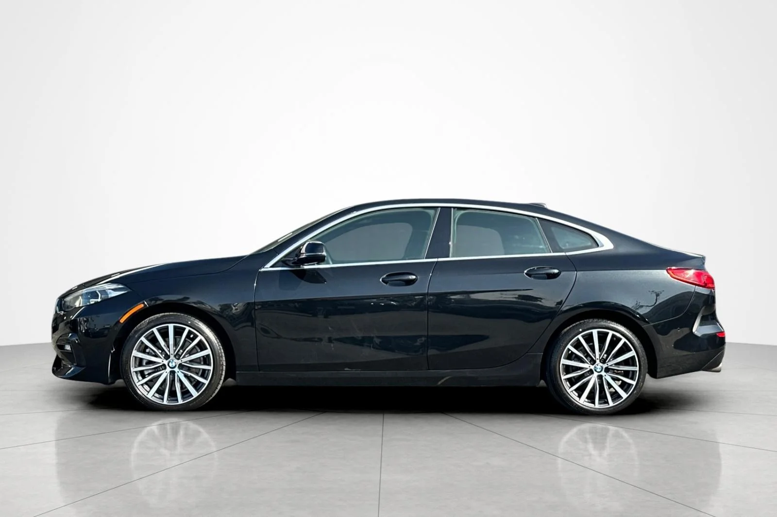 Used 2021 Black Sapphire Metallic BMW 228i xDrive image 2