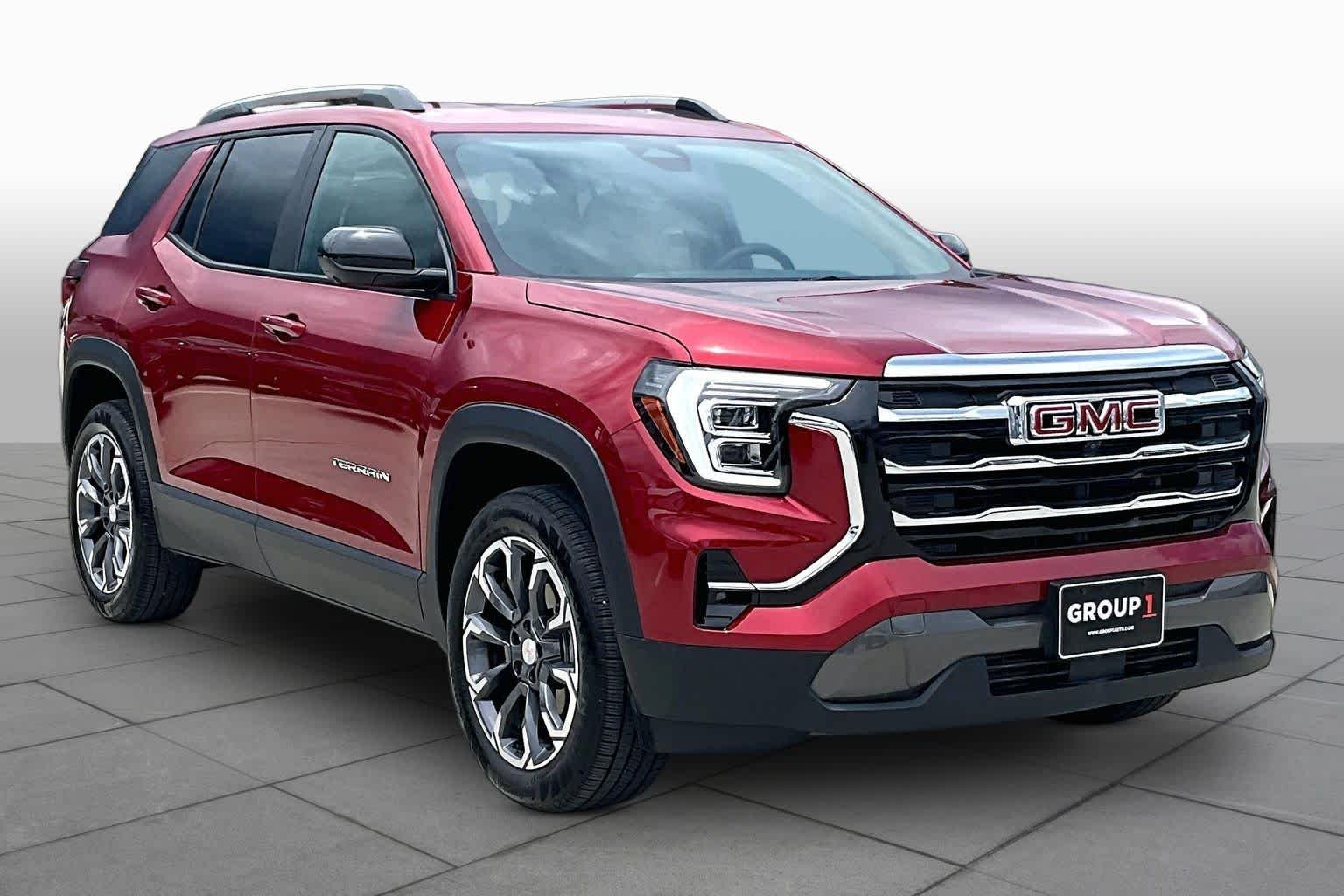 Used 2026 Volcanic Red Tintcoat GMC FWD Elevation image 3