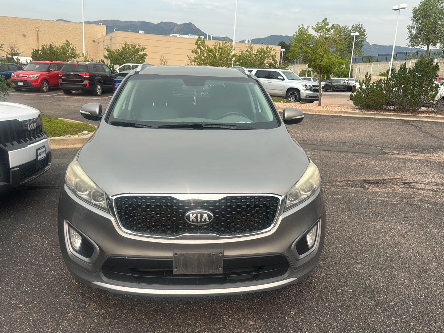 Used 2016 Titanium Silver Kia EX image 1