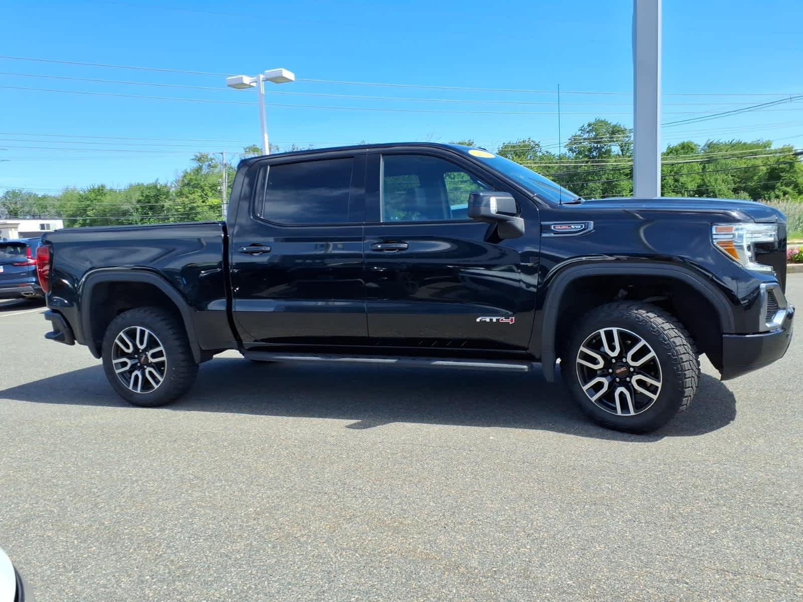 Used 2022 Ebony Twilight Metallic GMC AT4 image 4