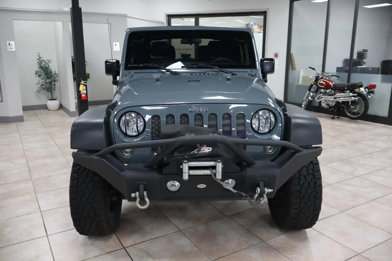 Used 2015 Hydro Blue Pearl Coat Jeep Sport image 5