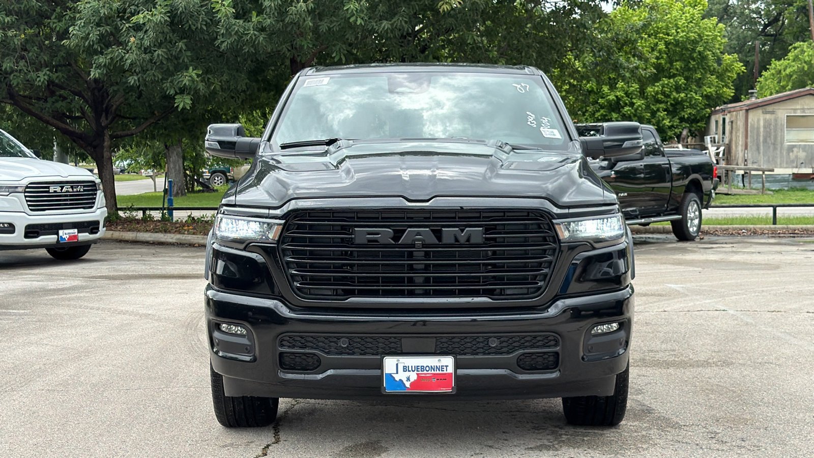 New 2026 Diamond Black Crystal Pearl-Coat Exterior Paint RAM Laramie image 2