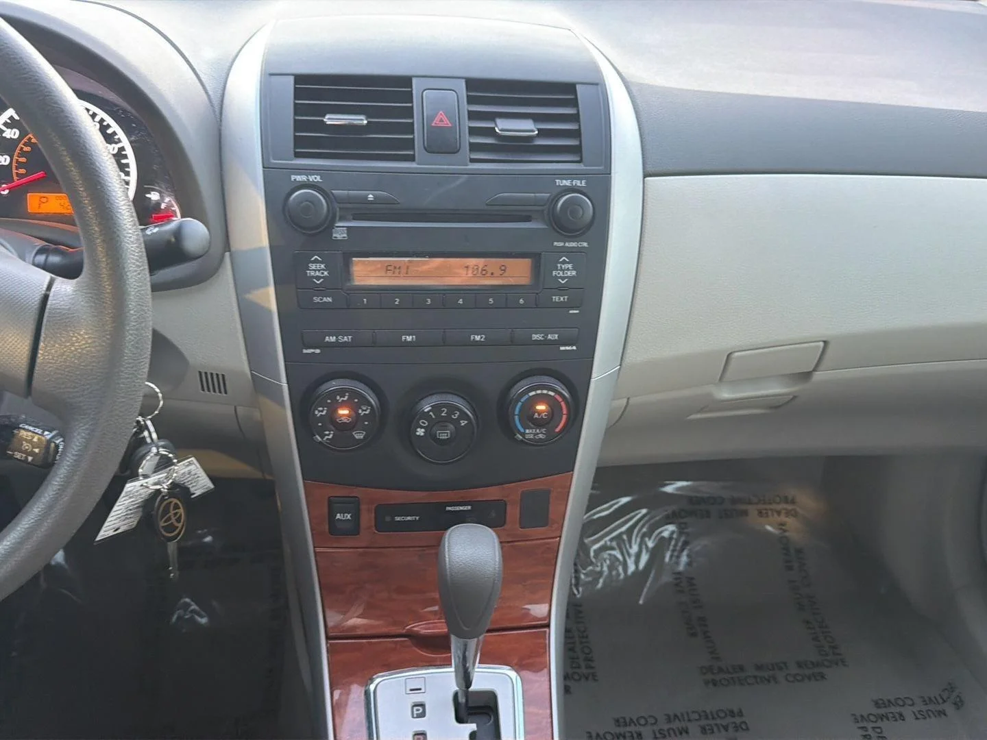 Used 2009 BROWN Toyota 4dr Sdn Man (Natl) image 14
