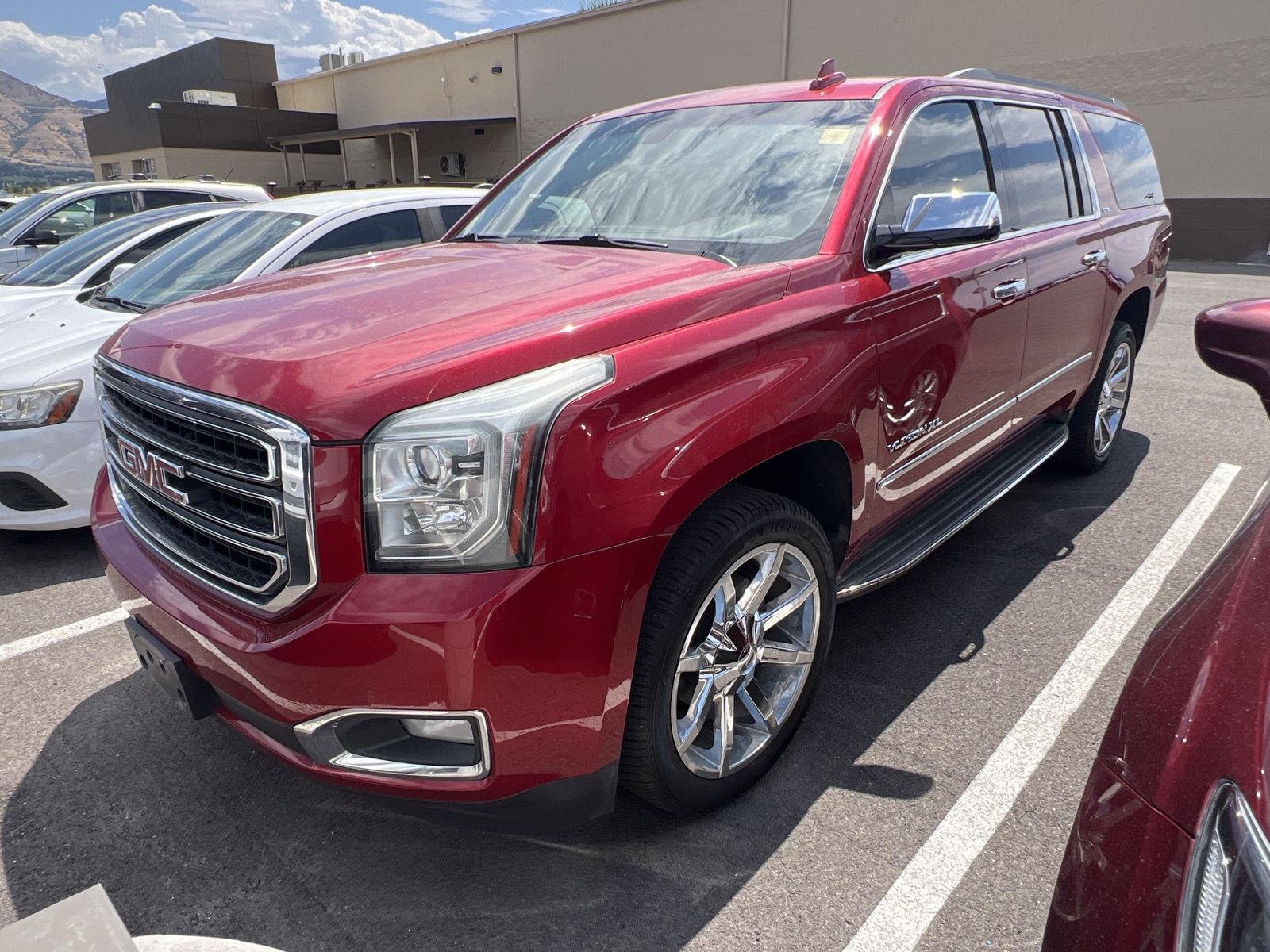 Used 2015 Crystal Red Tintcoat GMC SLE image 1