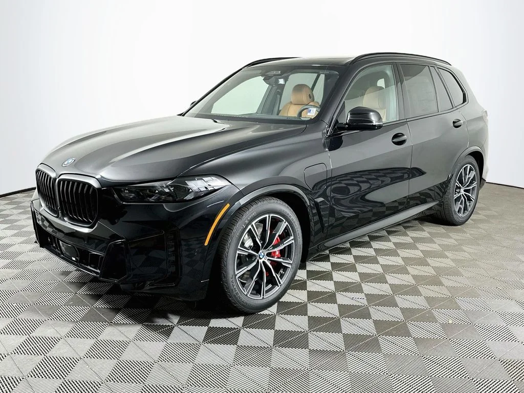 New 2026 Black Sapphire Metallic BMW xDrive50e image 1