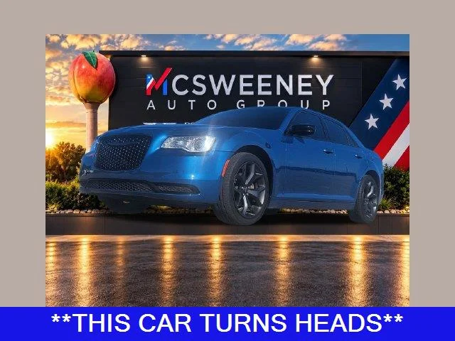 Used 2023 Blue Chrysler Touring image 1