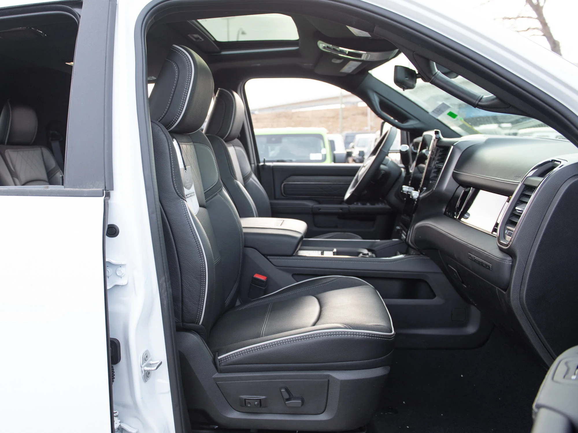 Used 2026 White RAM Limited* Mega Cab, 37 Inch Tires, 5 Inch Lift, Limitless Sled Deck image 28