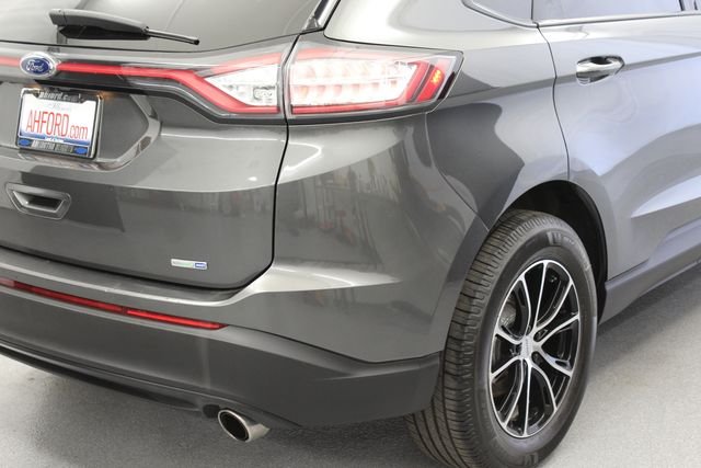 Used 2016 Magnetic Metallic Ford SE image 8