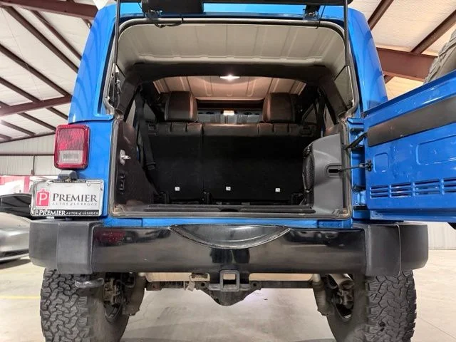 Used 2014 Blue Jeep Unlimited Sahara image 6