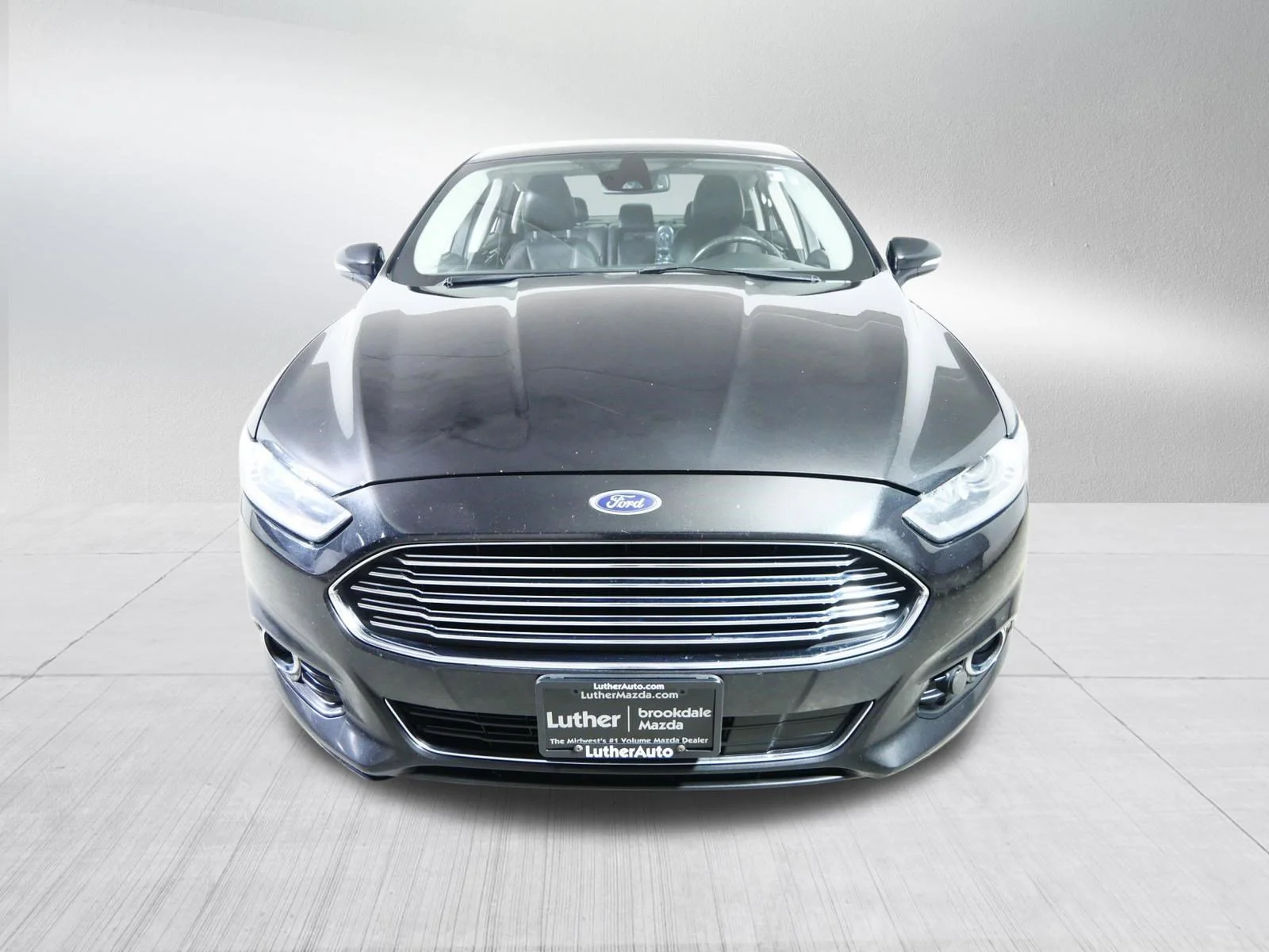 Used 2014 Ford Fusion Titanium with VIN 3FA6P0D96ER103208 for sale in Brooklyn Center, Minnesota