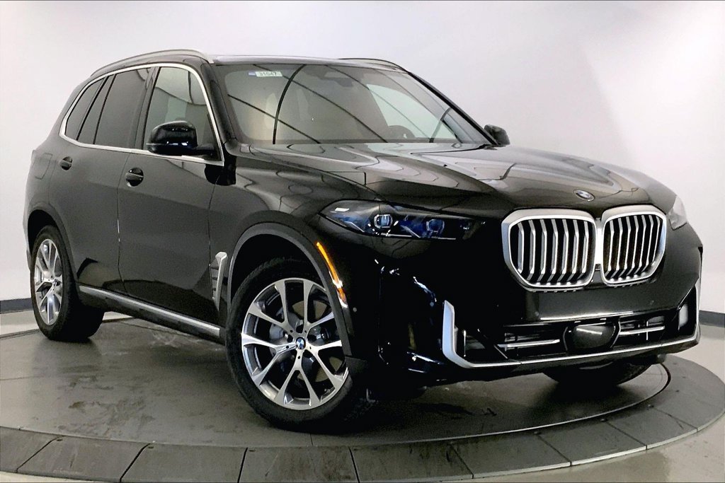 Used 2026 Black Sapphire Metallic BMW  image 1
