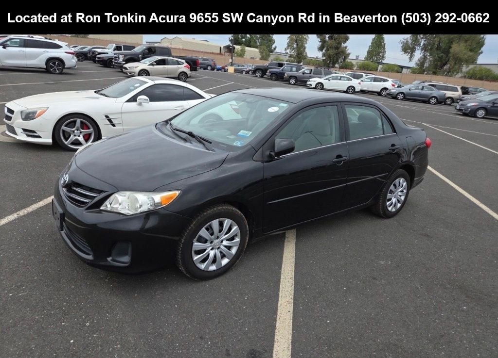 Used 2013 Black Sand Pearl Toyota LE image 6
