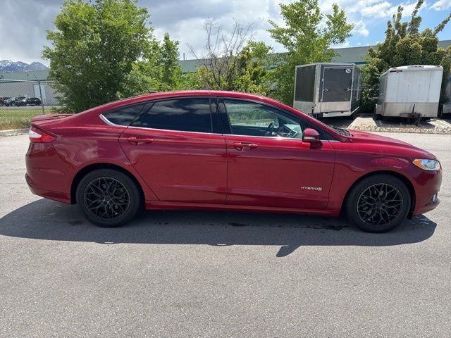 Used 2014 Ford Fusion SE Hybrid with VIN 3FA6P0LU7ER391696 for sale in Salt Lake City, UT