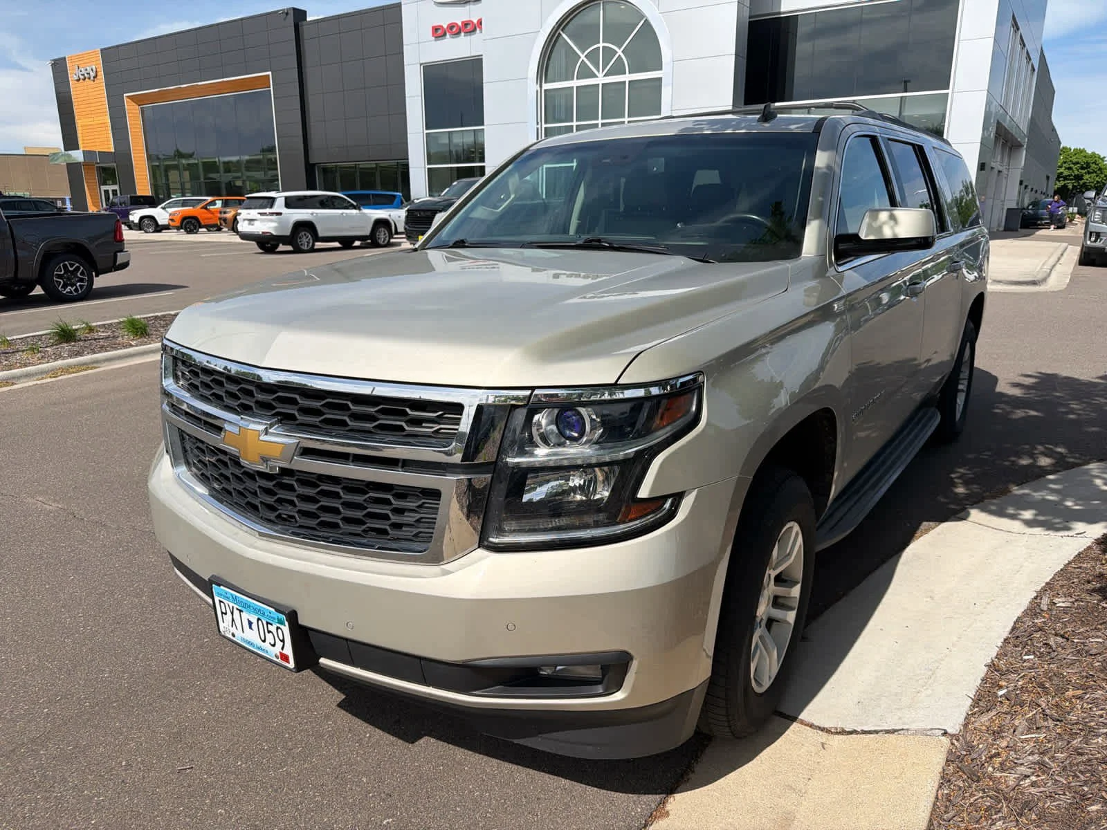 Used 2015 Chevrolet Suburban LT with VIN 1GNSKJKC7FR209957 for sale in Brooklyn Park, MN