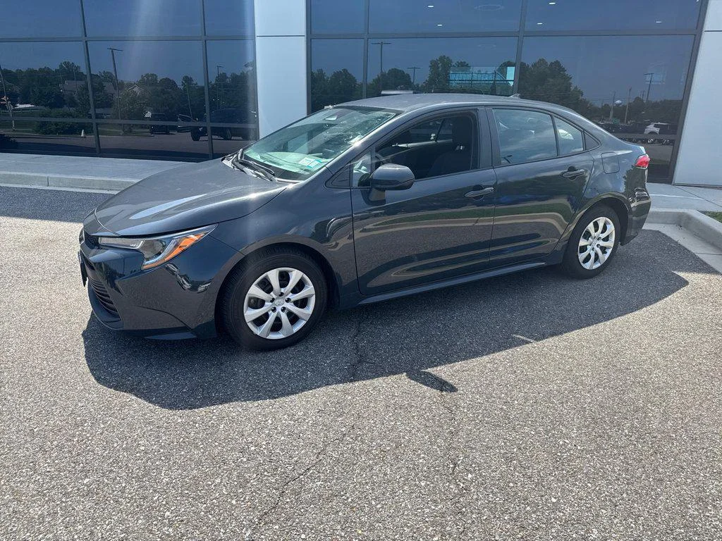 Used 2023 Celestite Toyota LE CVT (Natl) image 1