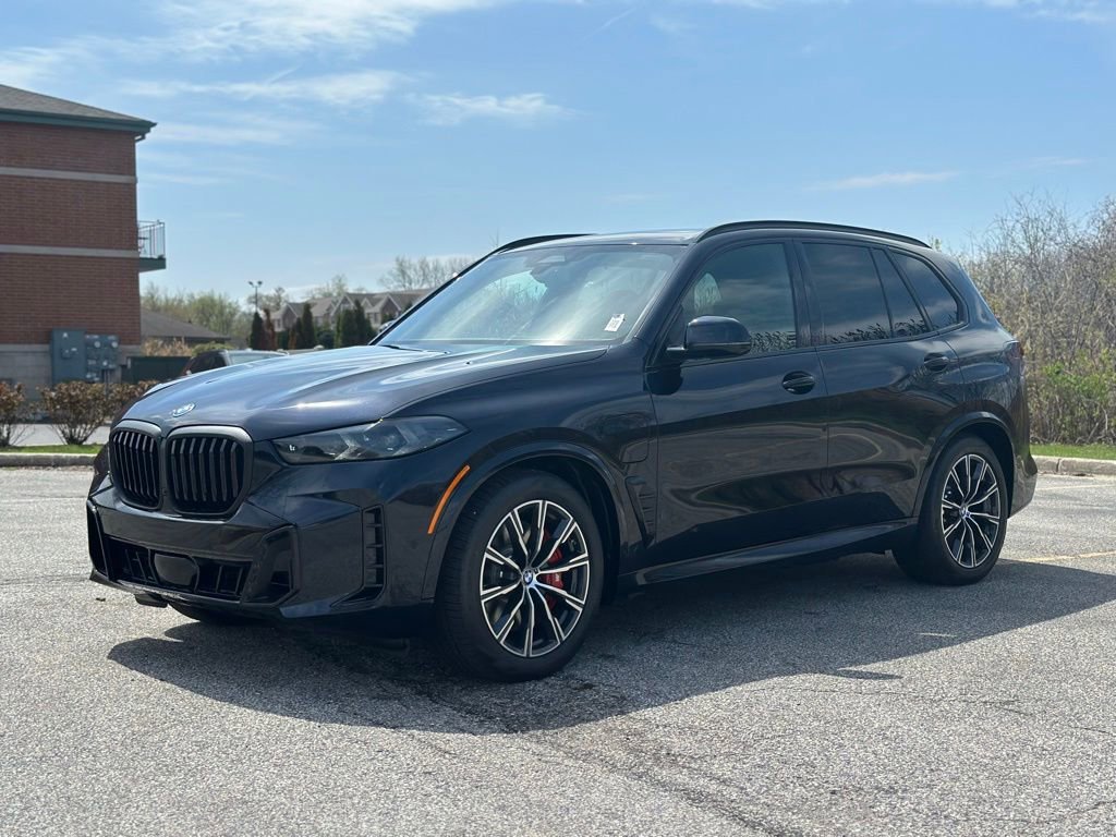 New 2026 Carbon Black Metallic BMW xDrive50e image 3