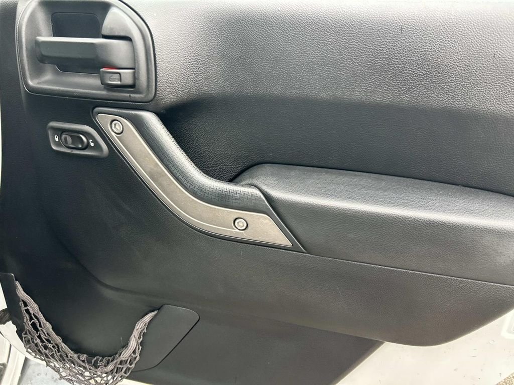 Used 2012 Bright White Jeep Unlimited Sport image 21