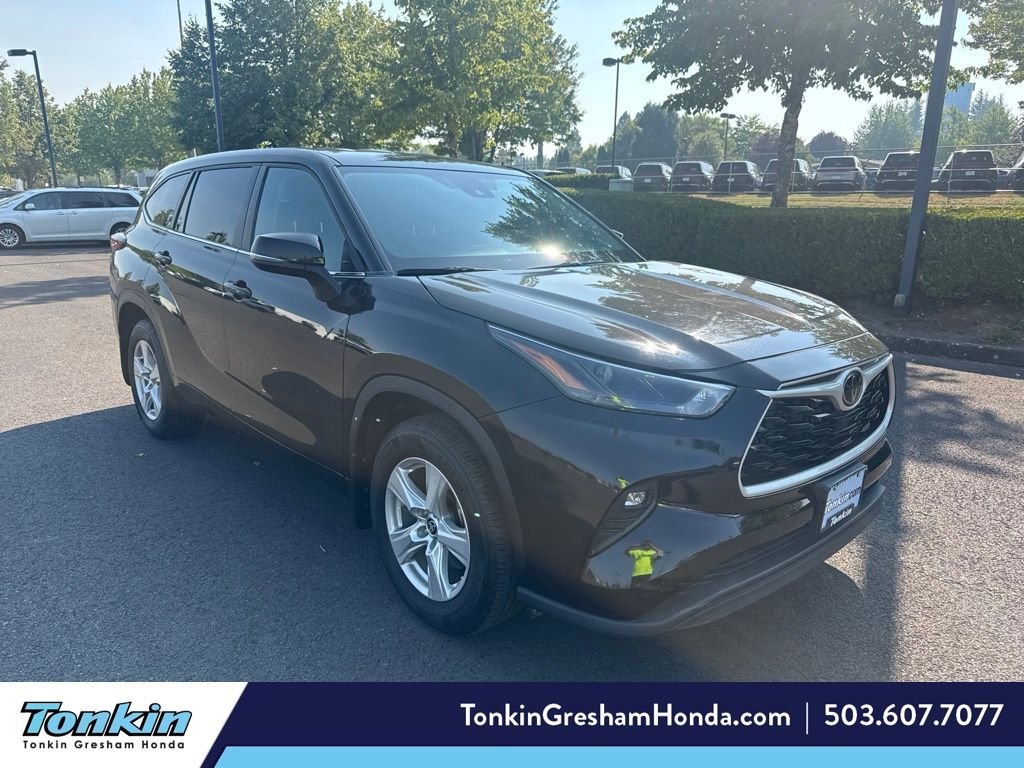 Used 2024 Midnight Black Metallic Toyota LE image 1
