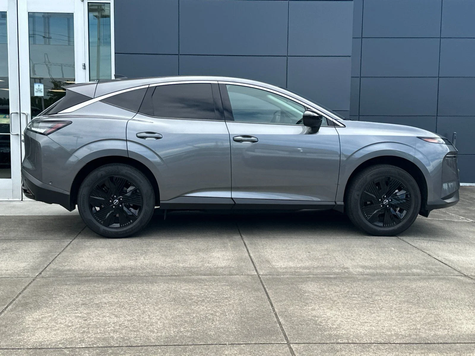 Used 2025 Gun Metallic Nissan SV image 2
