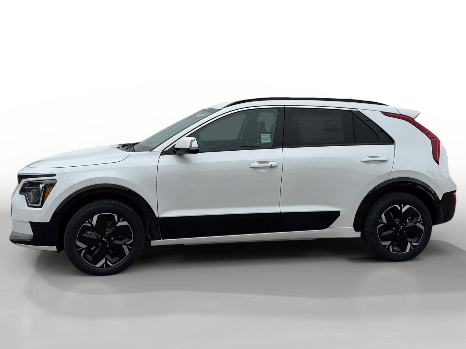 New 2026 Snow White Pearl Kia WIND image 2