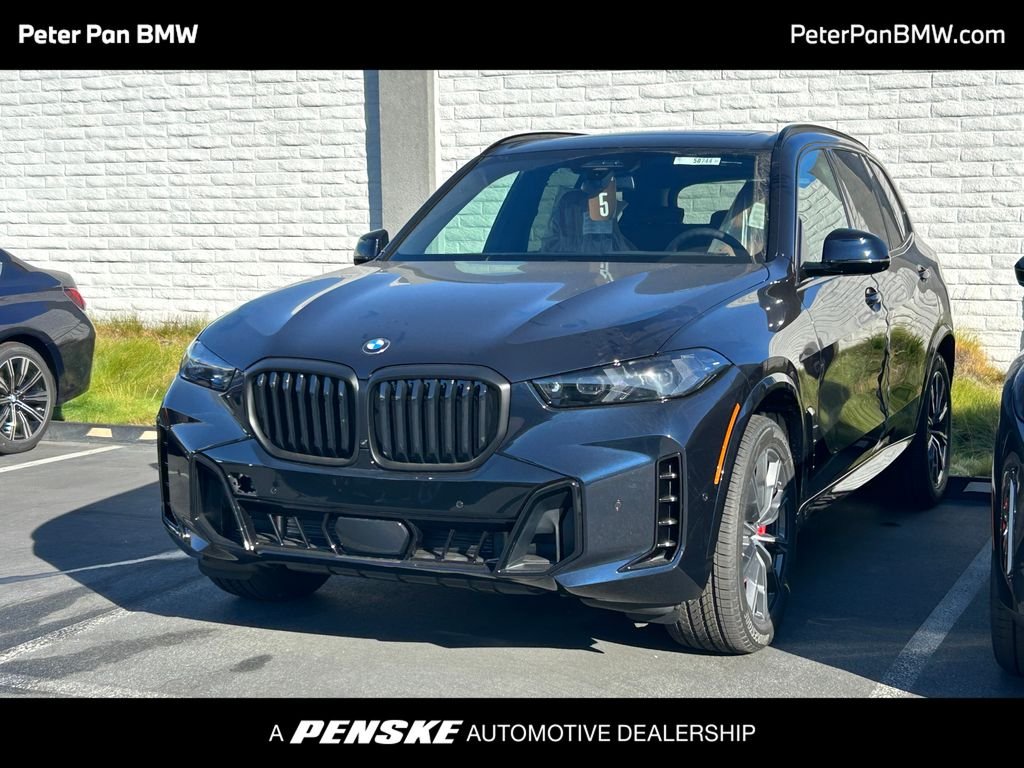 New 2026 Carbon Black Metallic BMW xDrive40i image 1