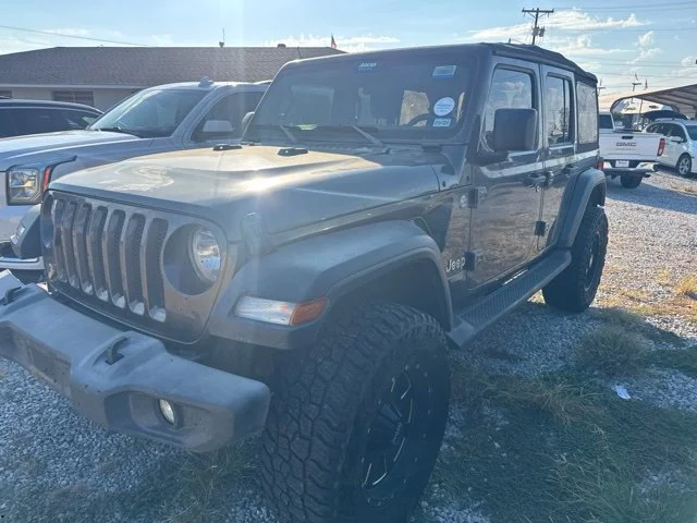 Used 2018 Crystal Metallic Jeep Unlimited Sport image 1