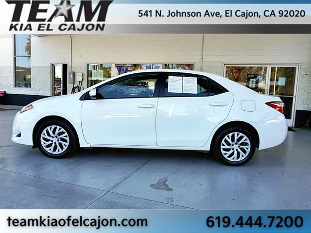 Used 2019 White Toyota LE image 6