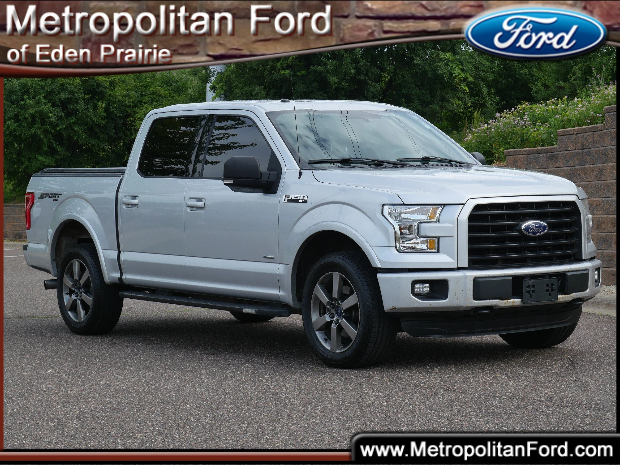 Used 2016 Ingot Silver Metallic Ford XLT 4WD SuperCrew 145 image 1