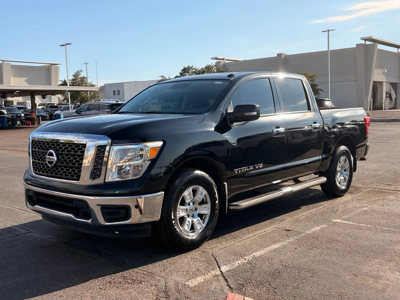 Used 2018 Magnetic Black Nissan SV image 1
