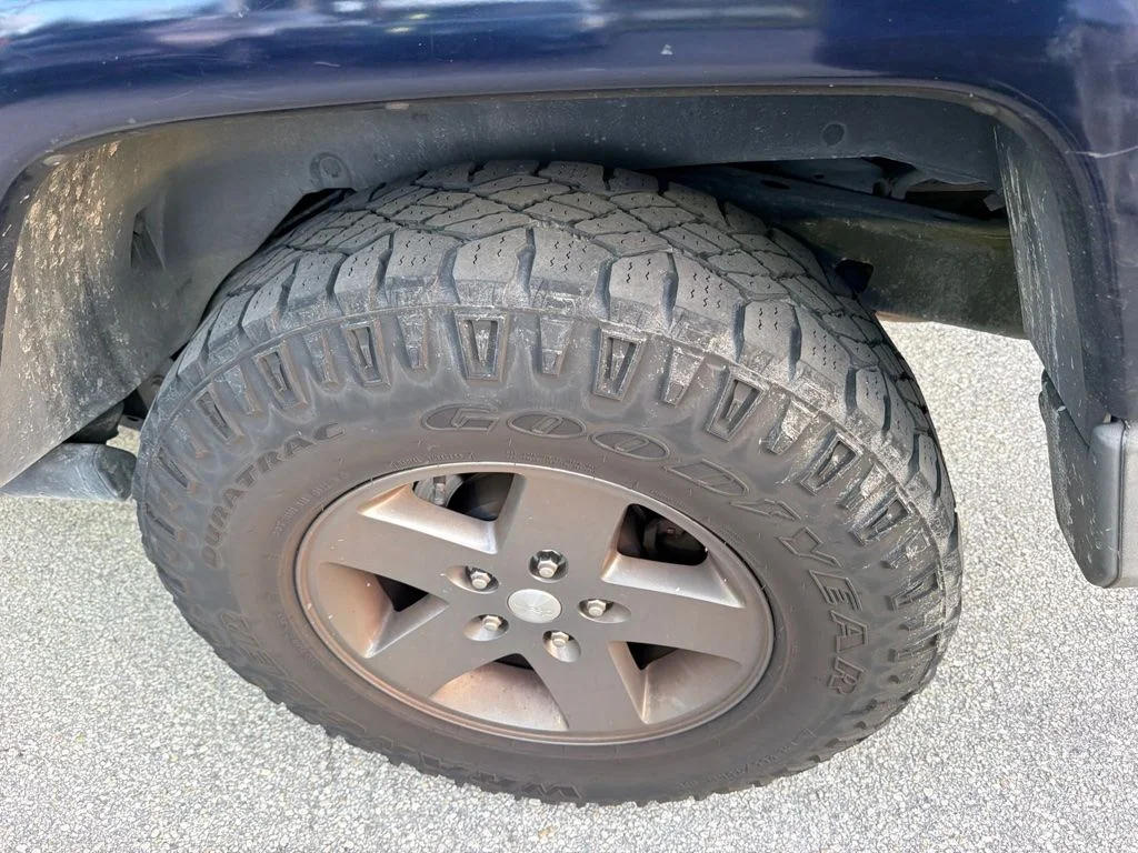 Used 2013 True Blue Pearlcoat Jeep Unlimited Freedom Edition image 9