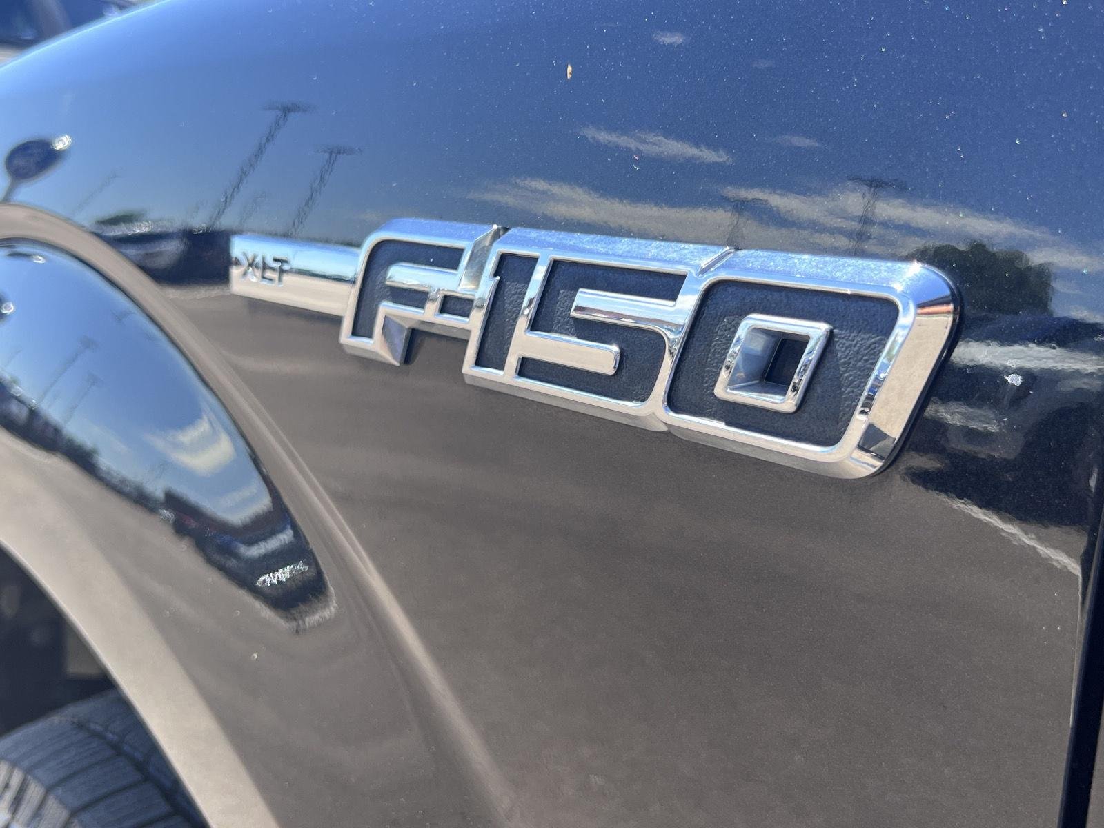 Used 2011 Tuxedo Black Metallic Ford XLT image 9