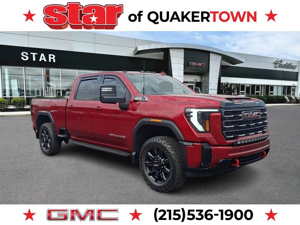 Volcanic Red Tintcoat 2025 GMC Sierra 2500HD AT4 Crew Cab 4WD Pickup Truck Four-Wheel Drive
