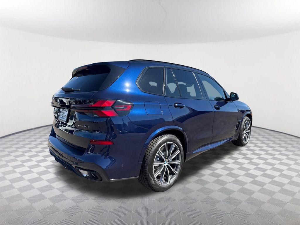 New 2026 Tanzanite Blue II Metallic BMW xDrive50e image 4