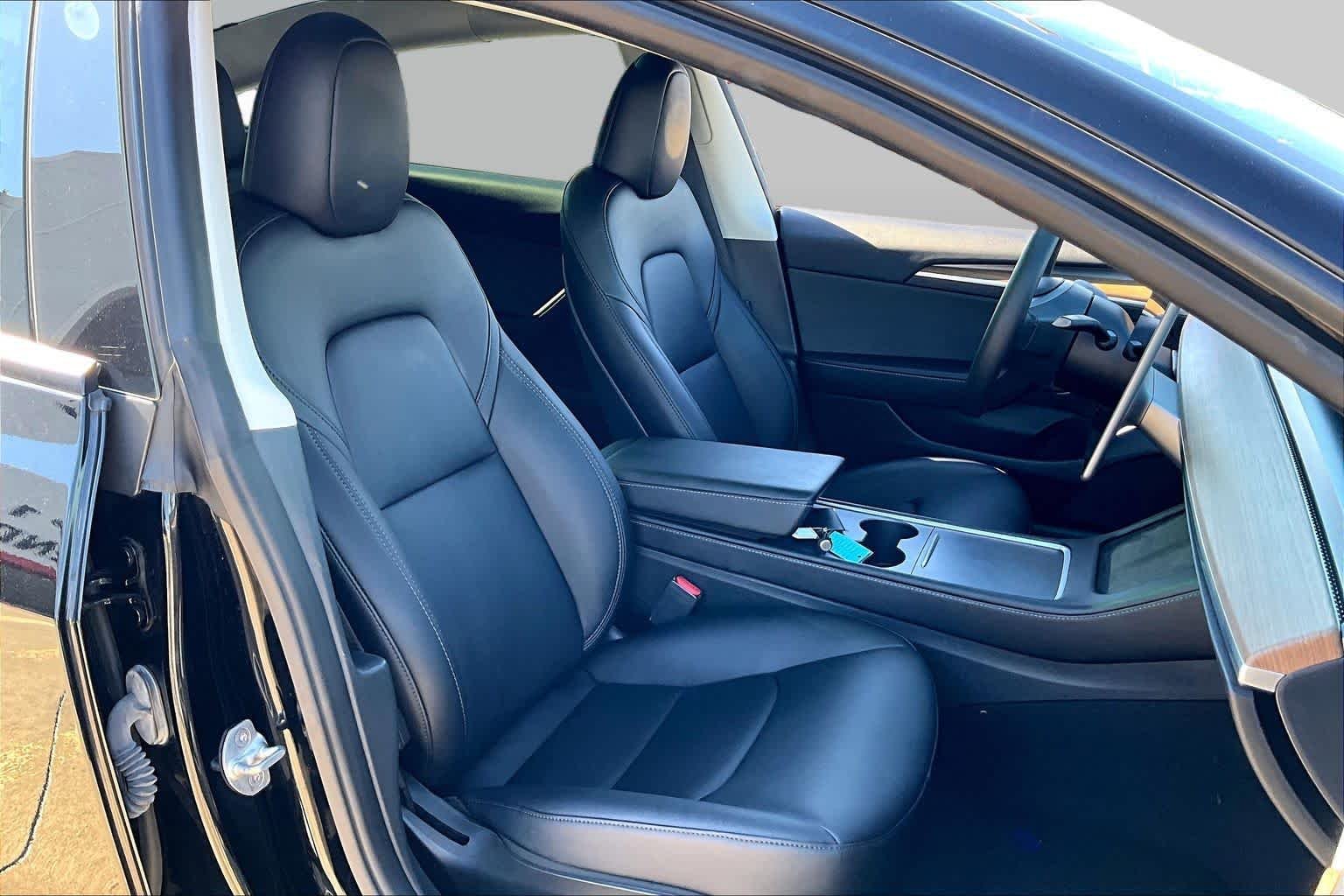 Used 2023 Solid Black Tesla  image 8