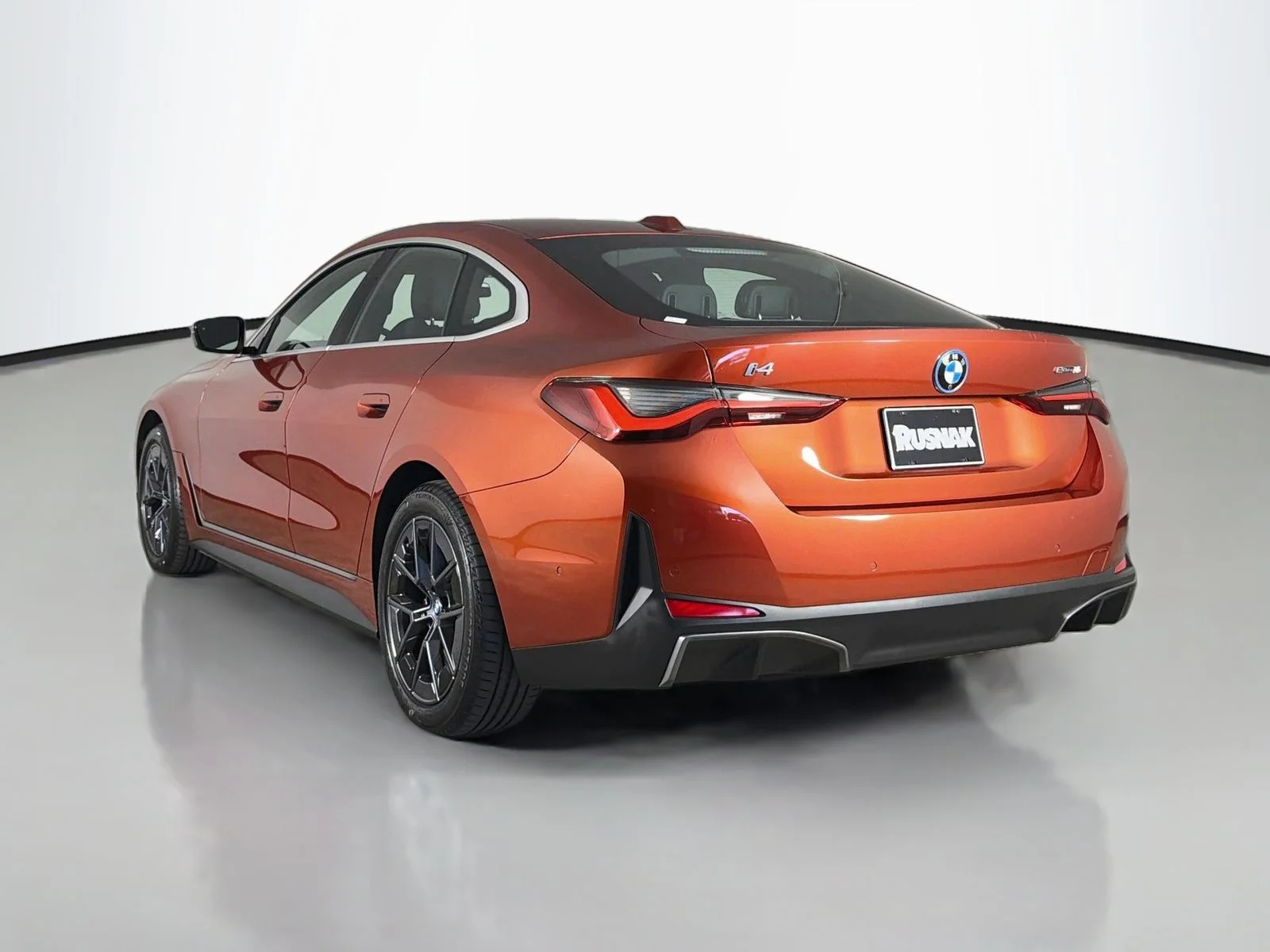 Certified Used 2024 Sunset Orange Metallic BMW eDrive35 image 5