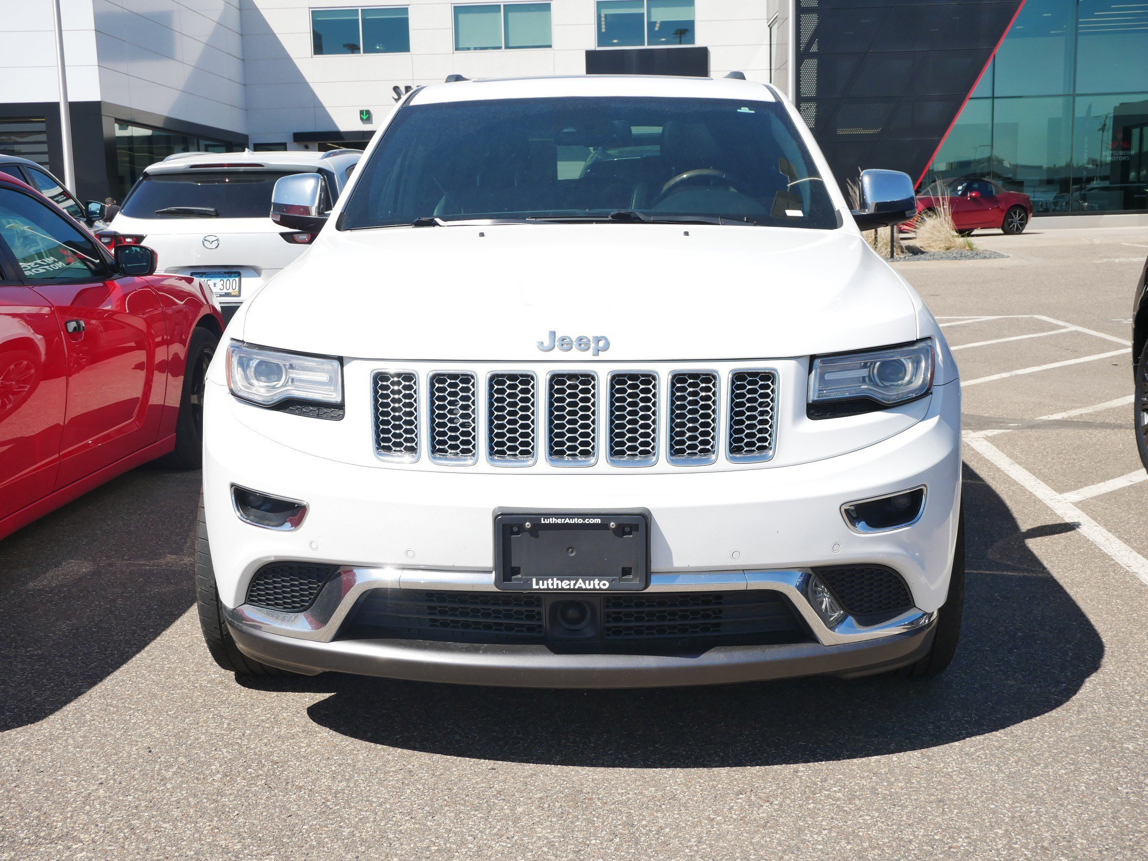 Used 2014 Jeep Grand Cherokee Summit with VIN 1C4RJFJG7EC233463 for sale in Brooklyn Center, Minnesota