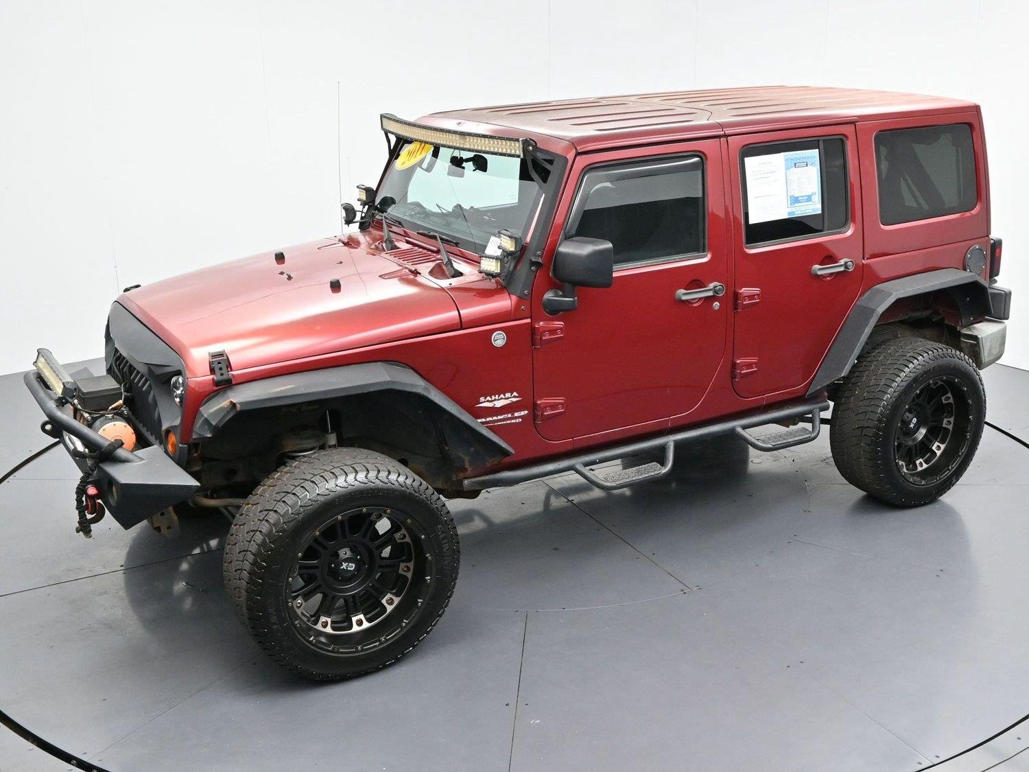 Used 2011 Deep Cherry Red Crystal Pearlcoat Jeep Sahara image 39
