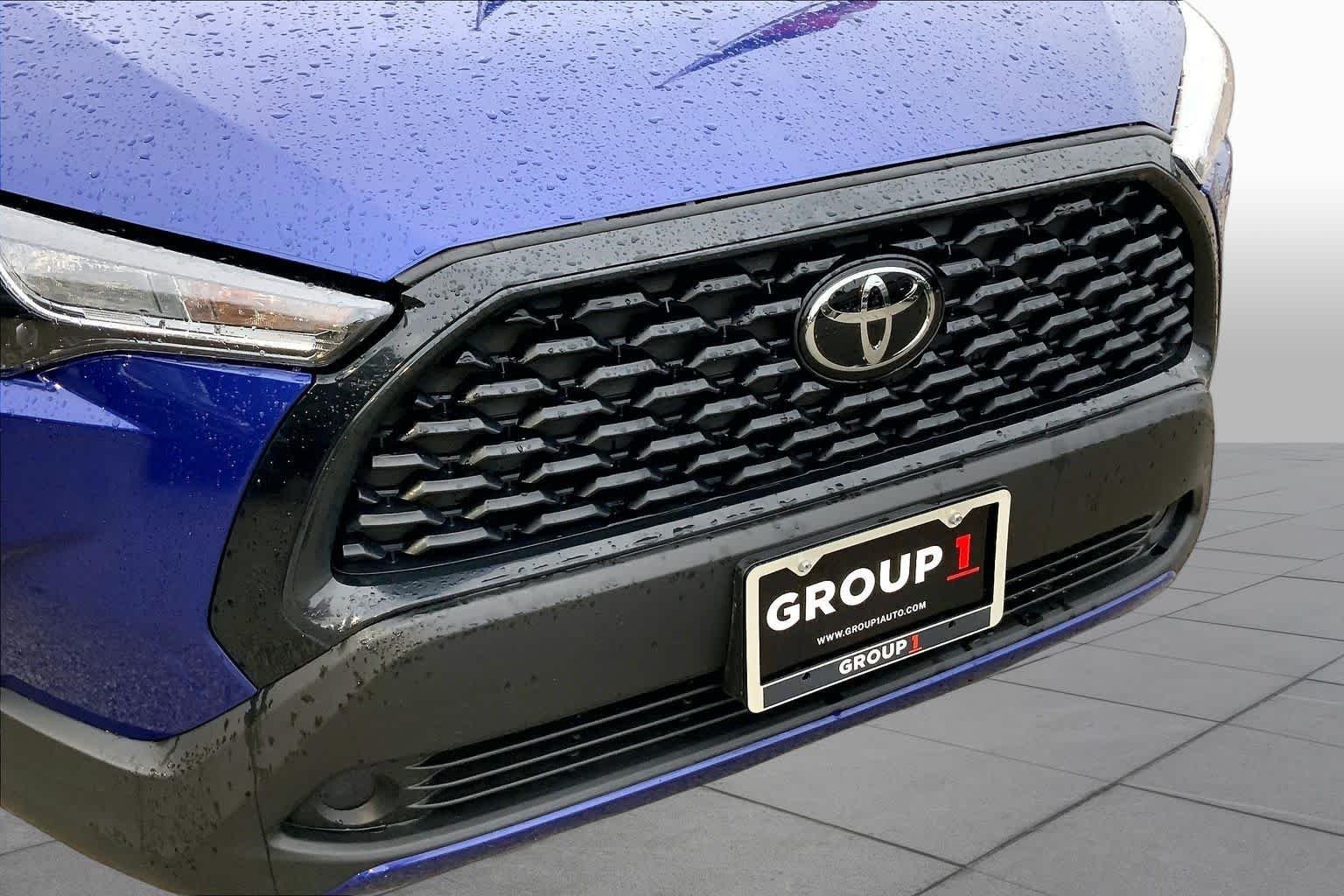 Used 2024 Blue Crush Metallic Toyota LE image 30