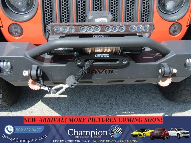 Used 2015 Orange Jeep Unlimited Sport image 3