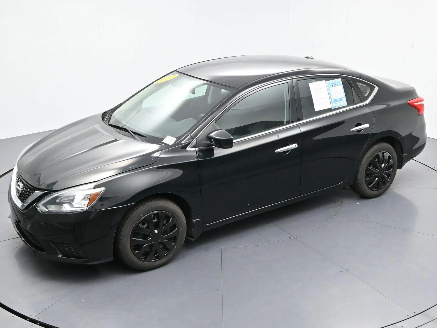 Used 2017 Super Black Nissan SV image 32